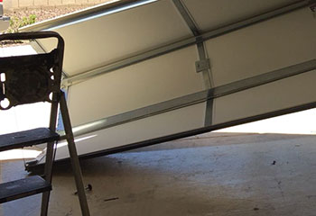 Garage Door Off Track | Garage Door Repair Manor Cheap Garage Door Off Track | Garage Door Repair Manor TX